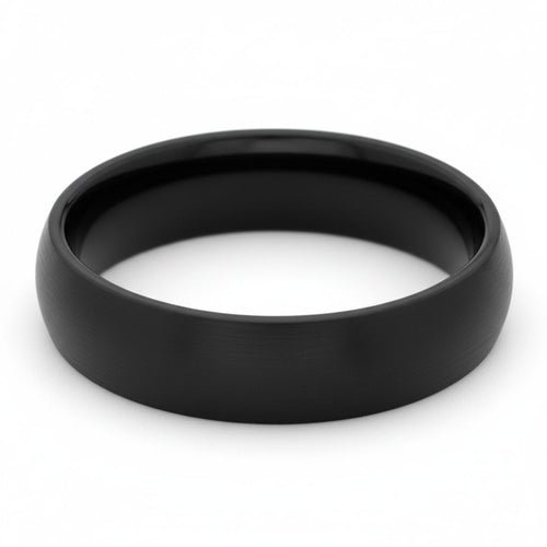 Black tungsten wedding ring on a white background.